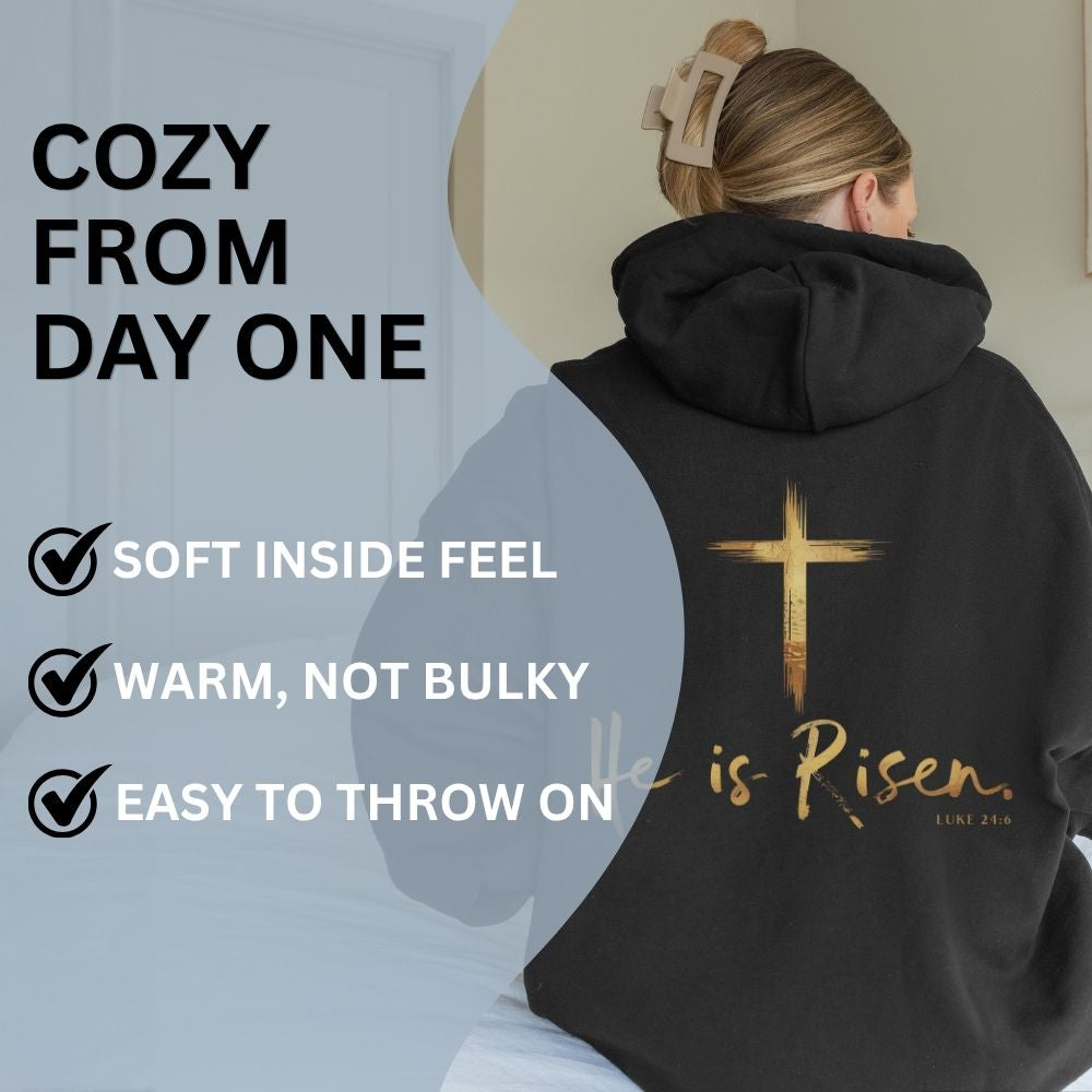 Person wearing a black hoodie with a cross and 'He is Risen' text, with promotional text about the hoodie's features.