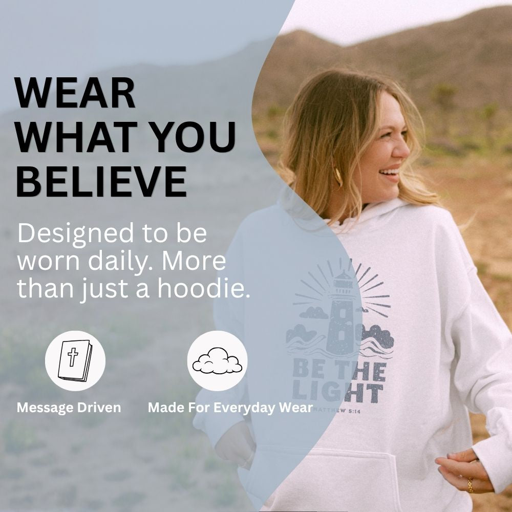 Woman wearing a hoodie with 'Be the Light' design in a desert setting, with promotional text overlay.