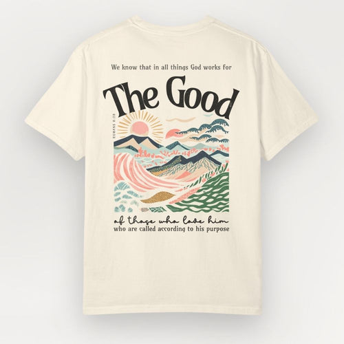 Beige t-shirt with a scenic design and text on a white background