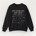 Black sweatshirt with white text and graphics on a white background