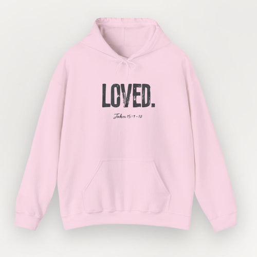 Pink hoodie with 'LOVED' text on a light gray background
