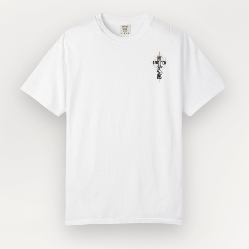A white Everyday Faith short-sleeve crewneck t-shirt with a small black and white cross graphic on the left chest, displayed against a light off-white background.