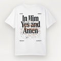 A white Everyday Faith short-sleeve t-shirt with a large graphic print on the back. The design features the text 'In Him Yes and Amen' in black, overlaid with a brown cursive script, and surrounded by a light brown sketch of a tree.