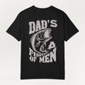 A black Everyday Faith short-sleeve t-shirt with a distressed white graphic print featuring a largemouth bass and the text 'DAD'S A FISHER OF MEN' on a light gray background.