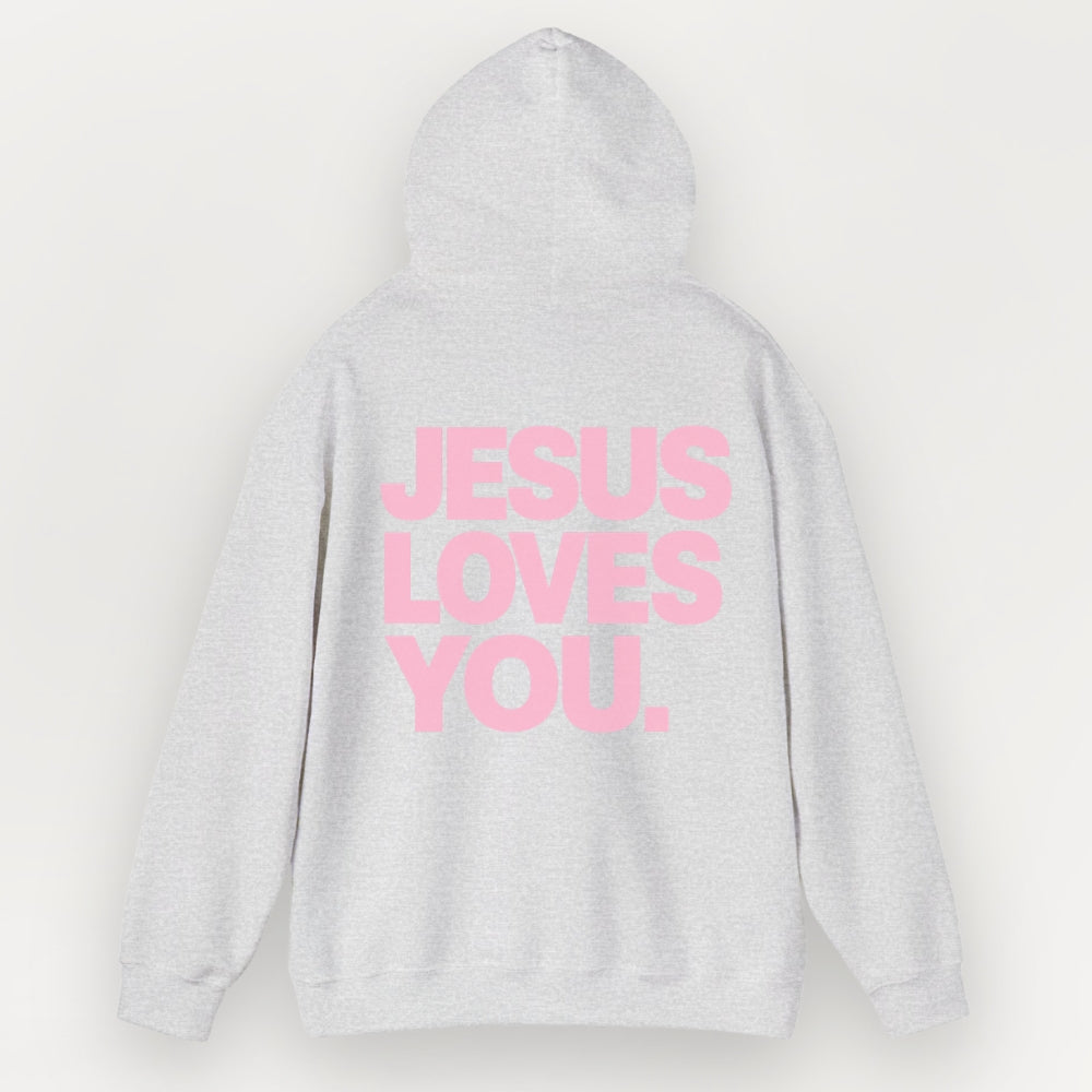 A light gray heather Everyday Faith pullover hoodie shown from the back, featuring the phrase 'JESUS LOVES YOU.' printed in bold pink capital letters across the back.