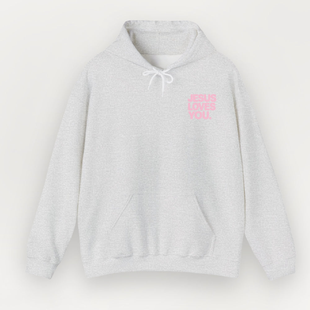 A light heather gray pullover Everyday Faith hoodie with a small pink text graphic on the left chest reading 'JESUS LOVES YOU'. The hoodie features a white drawstring hood, a front kangaroo pocket, and is photographed against a clean, off-white background.