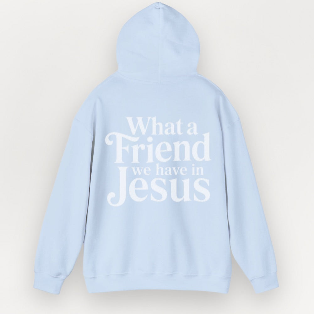 Light blue Everyday Faith essential hoodie with text 'What a Friend we have in Jesus' on a light gray background.