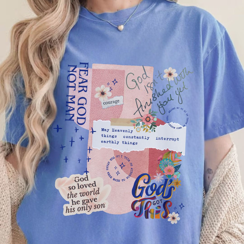 Model wearing a blue faith-inspired t-shirt with a collage style design and Christian message