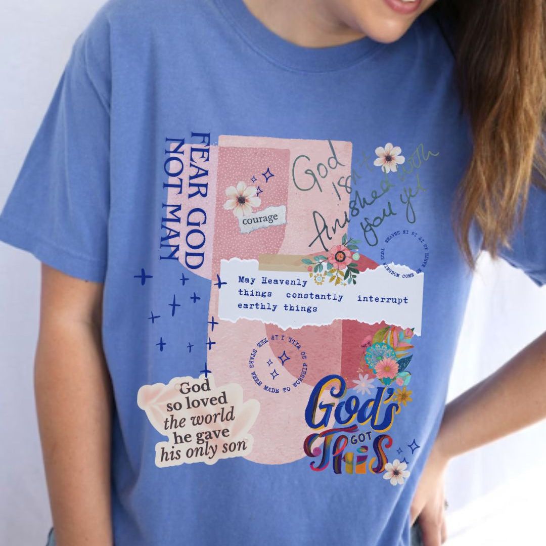 Model wearing a blue faith-inspired t-shirt with a collage style design and Christian message