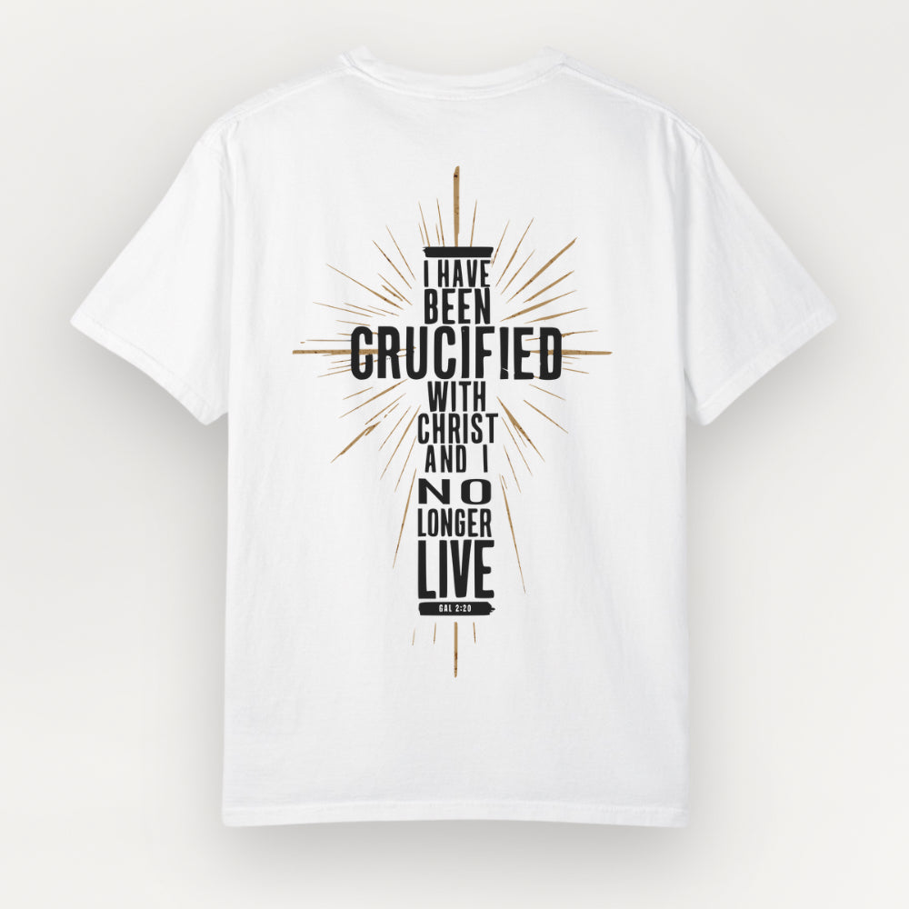 A white Everyday Faith short-sleeve t-shirt shown from the back, featuring a graphic print of a crucified cross with the text 'I HAVE BEEN CRUCIFIED WITH CHRIST AND I NO LONGER LIVE' in black and gold.