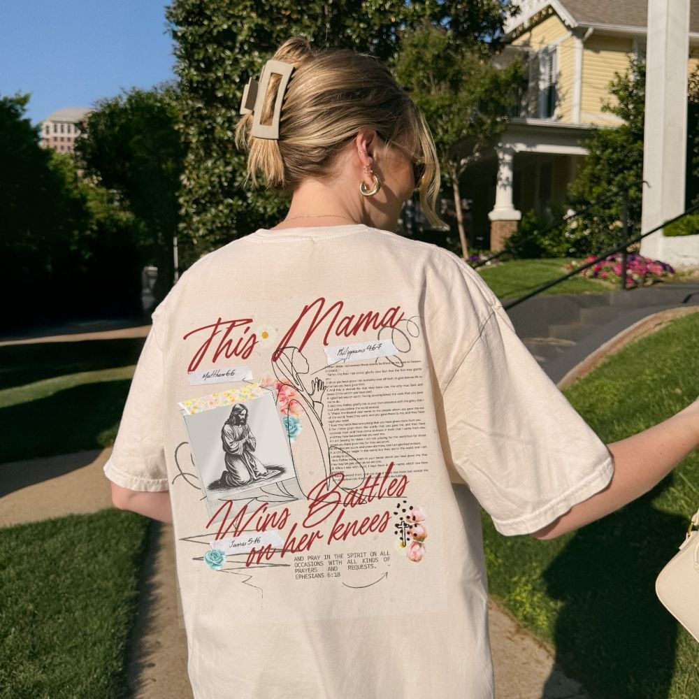 This Mama Wins Battles on Her Knees Heavyweight Tee