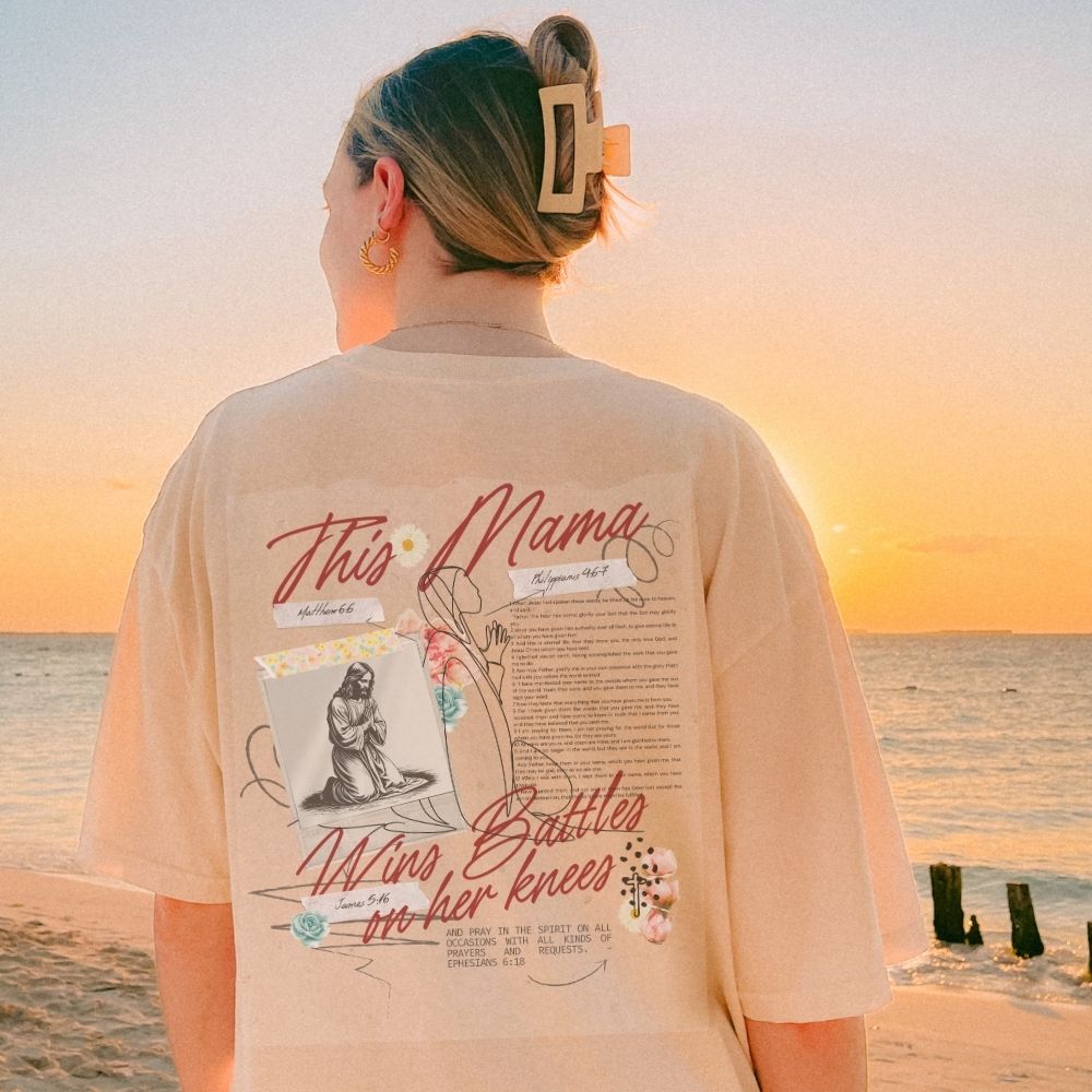 This Mama Wins Battles on Her Knees Heavyweight Tee