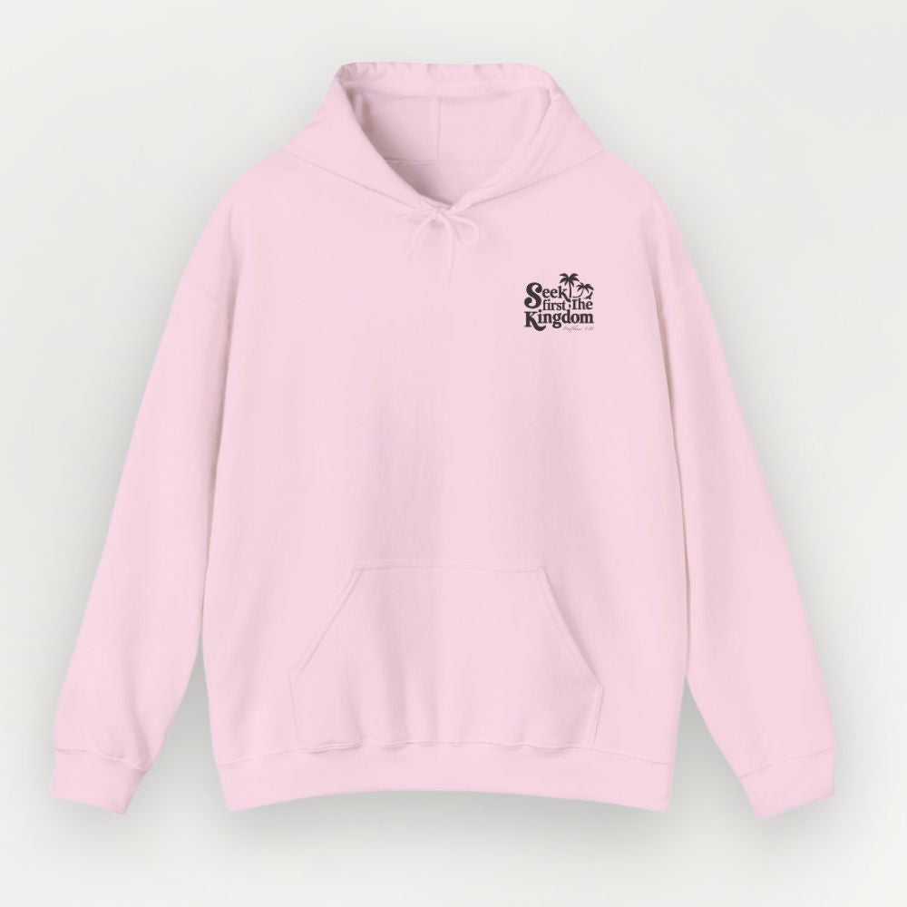 Pink hoodie with a logo on the chest against a light gray background