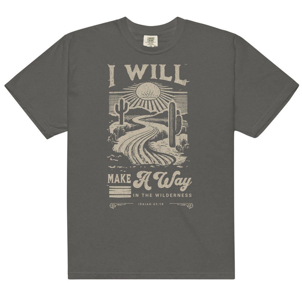 Close-up of I Will Make a Way Christian tee featuring desert path and scripture design
Woman styled in a faith-based Isaiah 43:19 t-shirt outdoors